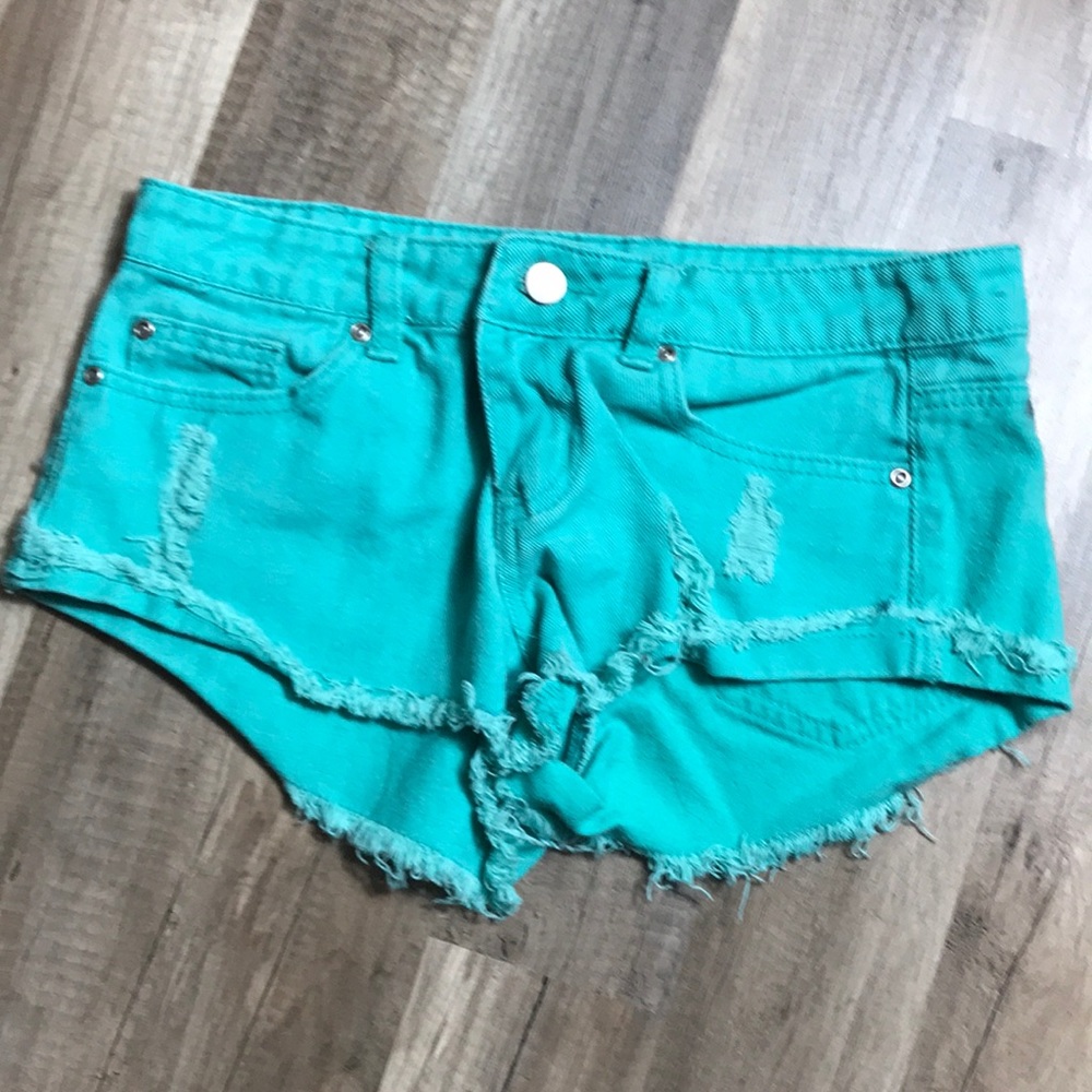 Forever 21 Turquoise distressed jean shorts